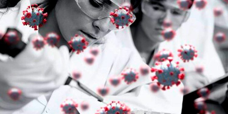 Imagen de tres médicos examinando un virus gripal