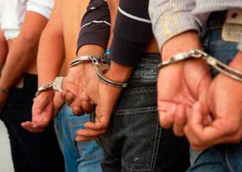 Venezolanos detenidos con fusil en el Naco ligados a red de trata MC Girasol